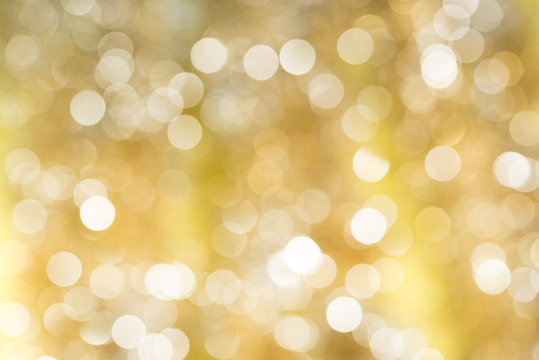 Gold blurred abstract bokeh light backgound