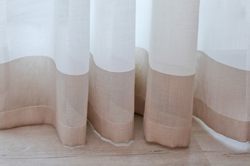 Room window with colorful striped curtains