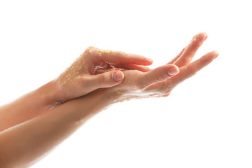 Female hands with scrub on white background