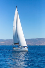 Obraz premium Sailing ship boats with white sails in the Sea. Luxury yachts...