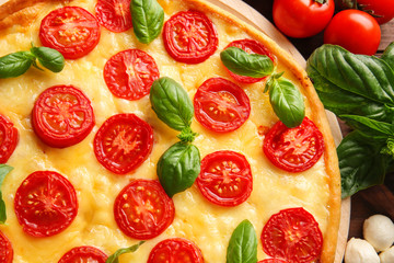 Fresh tasty pizza Margarita, closeup