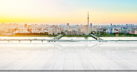 Business concept - Empty marble floor top with panoramic sky view of mountain under sunrise and...