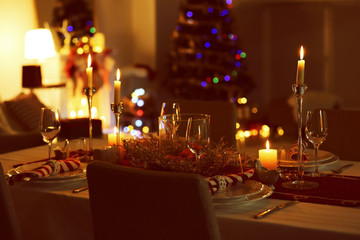 Close up view of table served for Christmas dinner, on blurred background