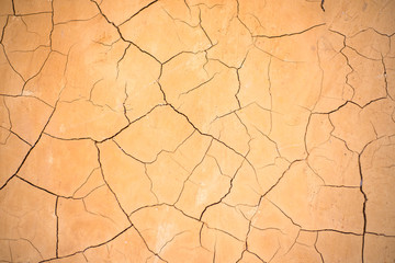 Brown clay earthen wall texture or background