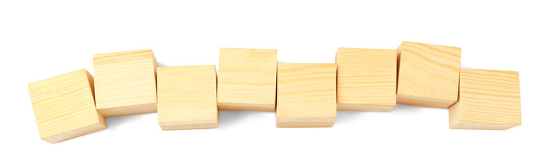 Empty wooden cubes on white background