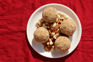 Rajasthani churma ladoo, made with coarsely ground wheat flour and roast with ghee and then mix dry fruits & sugar