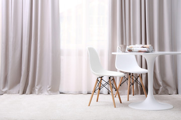 Modern room interior with new curtains