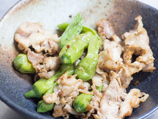 Japanese cuisine, fried pork and Japanese green bell pepper call