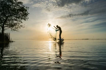  Silhouette of fishermen © chirawan_nt