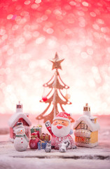 Christmas with pine branch on festive background.