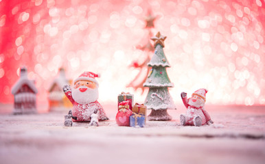 Christmas with pine branch on festive background.