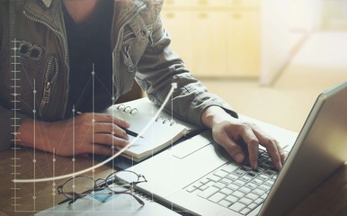 Business people on the desk with a laptop computer and work as a strategic market. Icon.Innovation graph