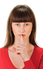 Naklejka premium Woman shows sign of silence