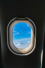 Fototapeta premium Plane window with cloud view .