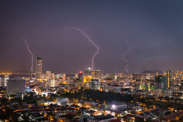 Naklejka na ściany i meble City of Penang during thunderstorm , Malaysia