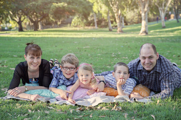 Fototapeta premium Happy family of five in the park
