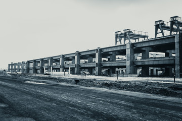 large concrete train station building construction site.