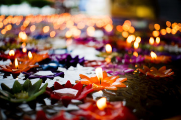 Candle carved lotus Floating on the water To worship Buddha with pray Blessings from God wishes.Merits