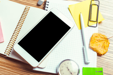 Smartphone on wooden table