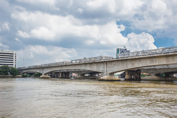 concrete bridge across the river.