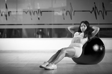 Trainer show exercise in gym