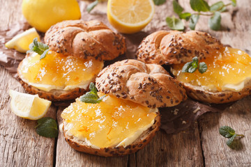 Sweet sandwiches with lemon jam and butter close-up. Horizontal