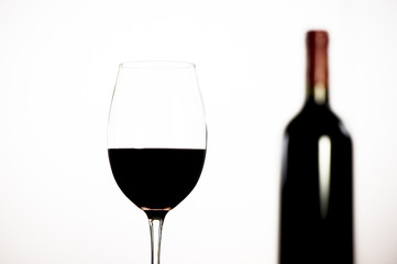 Red Wine bottle and glass on white background