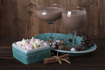  Eggnog in glasses and  meringue cake