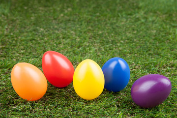 Fototapeta na wymiar easter eggs on a green background