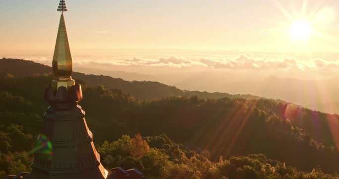 Aerial view of Buddhist pagoda temple in Thailand at sunrise
