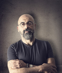 Portrait senior man on black background