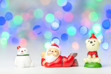 Santa claus and snowman with  bokeh background