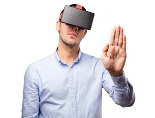 Young man using a virtual glasses