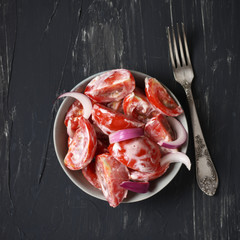 Tomato salad with sour cream