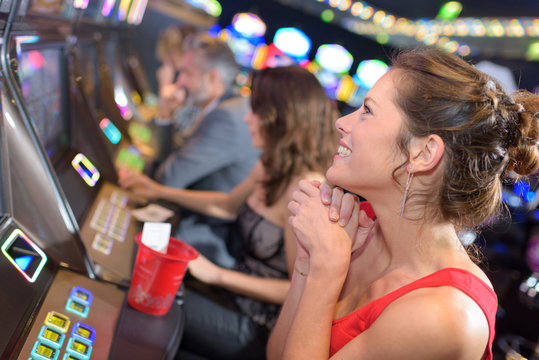 brunette girl winning in a casino