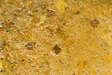 gold leaf on black background for you texture 