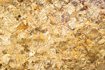 gold leaf on black background for you texture 