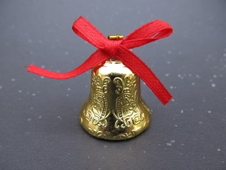 Background for new year and Christmas, Christmas tree, bell on dark background