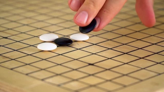 Chinese go game weiqi playing slow motion.