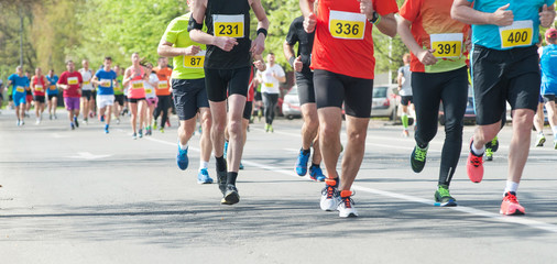 Marathon, street runners  in spring day