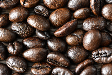 Roasted coffee beans on board close-up