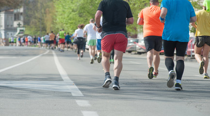 Marathon, street runners  in spring day