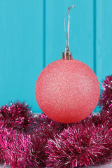 Pink Christmas ball and garland