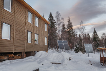 two-storey building shelter touristic campsite in the winter forest