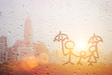 draw family dad mum and child hand with umbrella in the raining