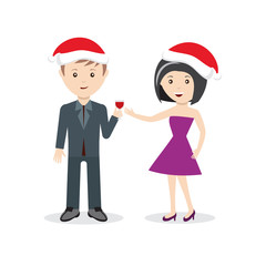 Man and woman in christmas hats with wine