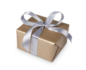 Christmas holiday gift box in golden paper isolated on white