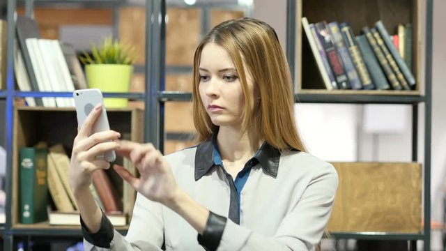 Woman Using Smartphone, Indoor Office