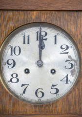 Vintage chiming wall clock on midnight at Christmas