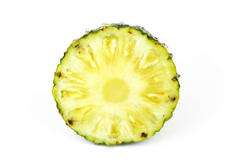 Ripe pineapple with slices isolated on white background